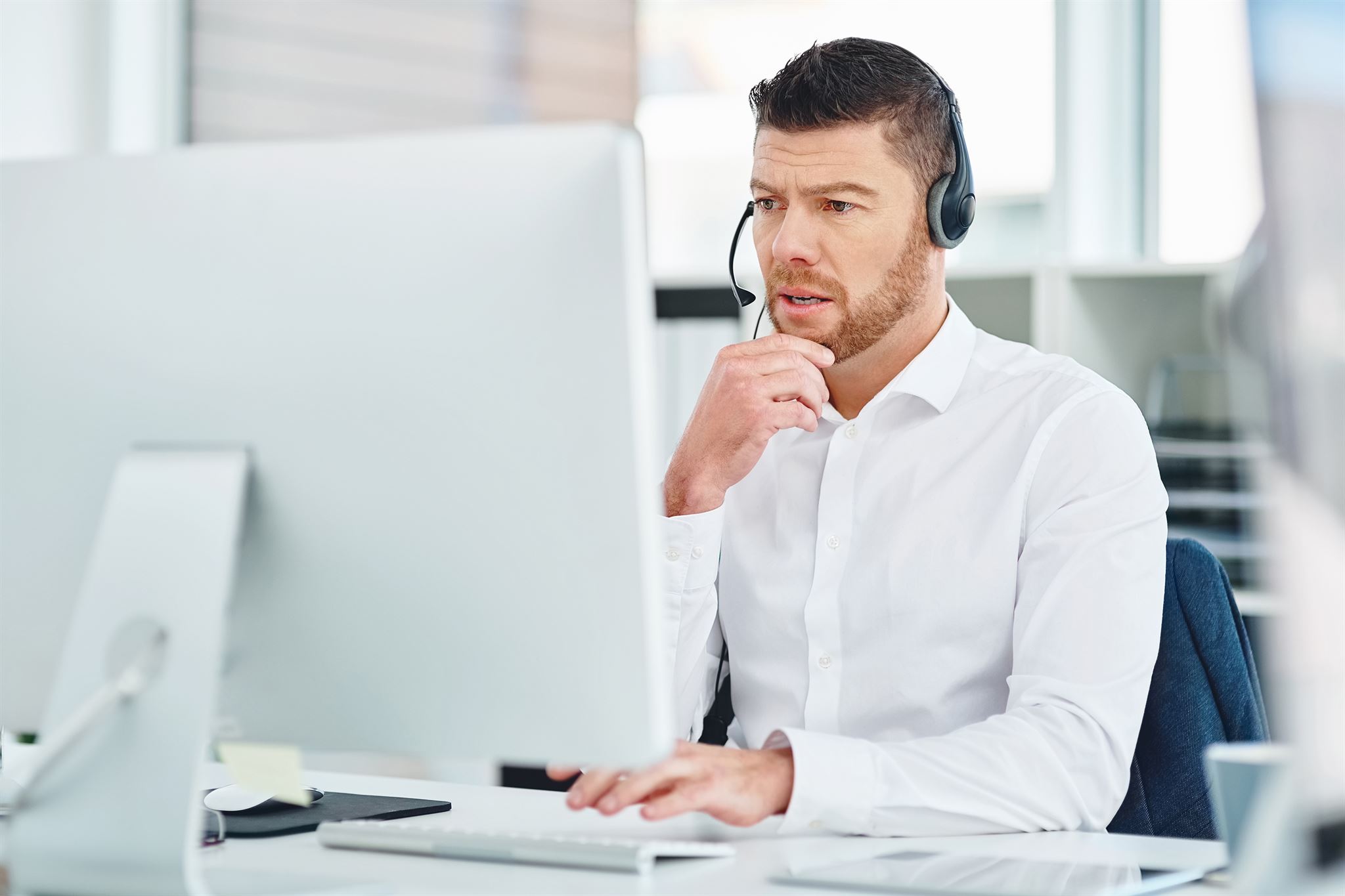 Customer support representative with headset